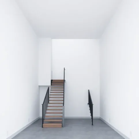 Czy klatka schodowa wlicza się do powierzchni całkowitej