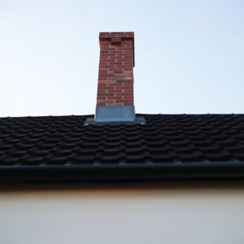 Wysokość komina ponad dach warunki techniczne